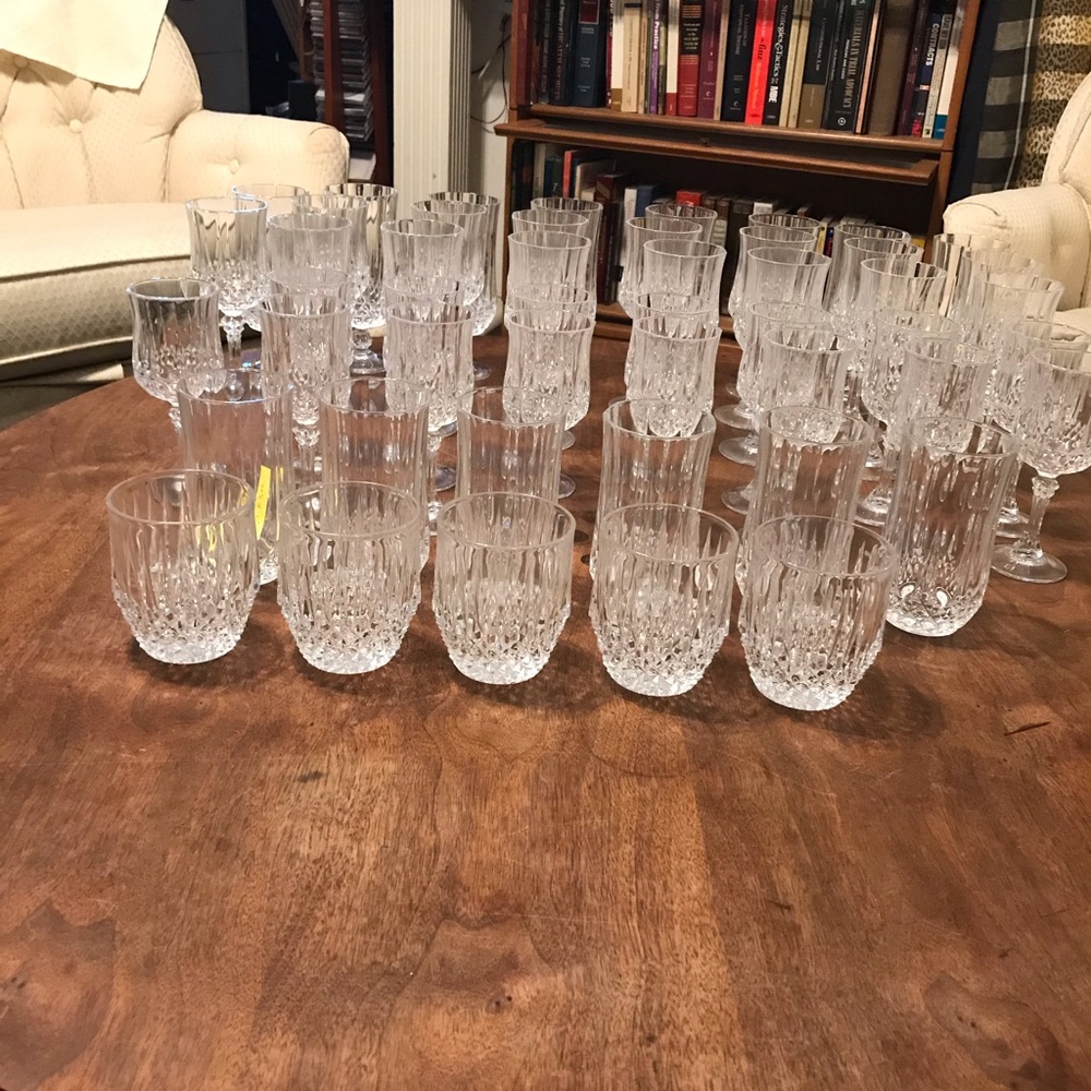 25 Vintage crystal goblets and glasses.